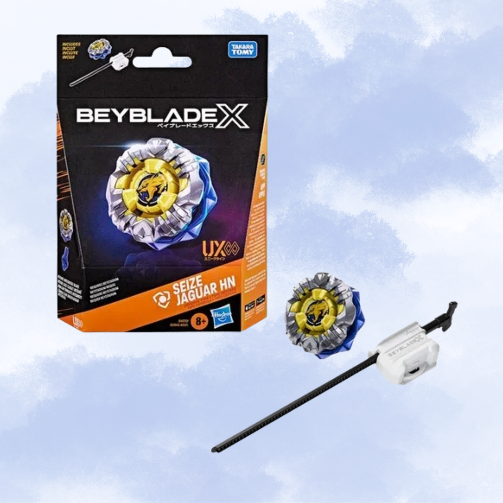 Beyblade X Seize Jaguar HN toy set showing the retail packaging box alongside the loose beyblade and launcher against a light blue cloudy background.
