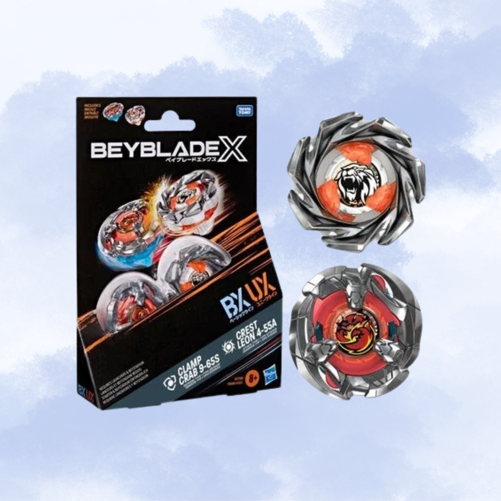 Beyblad X toy set showing the retail box and Clamp Crab & Crest Leon against a light blue cloudy background. The box is black with Beyblade X and BX-UY branding, and the tops are silver with red, orange, and black center designs.