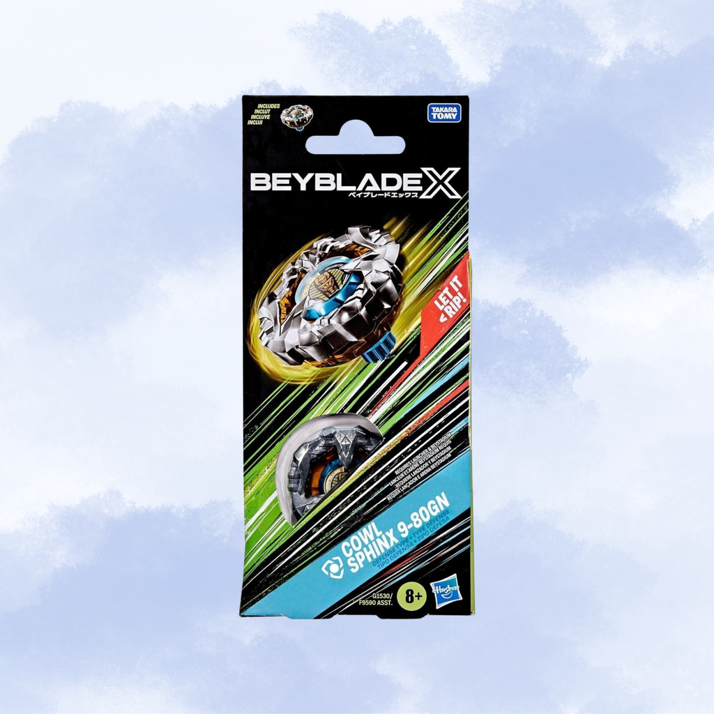 Tombstone x Hasbro Beyblade X Cowl Sphinx 9-80GN toy packaging card, featuRing a Beyblade X burst top with a metallic silver and gold design